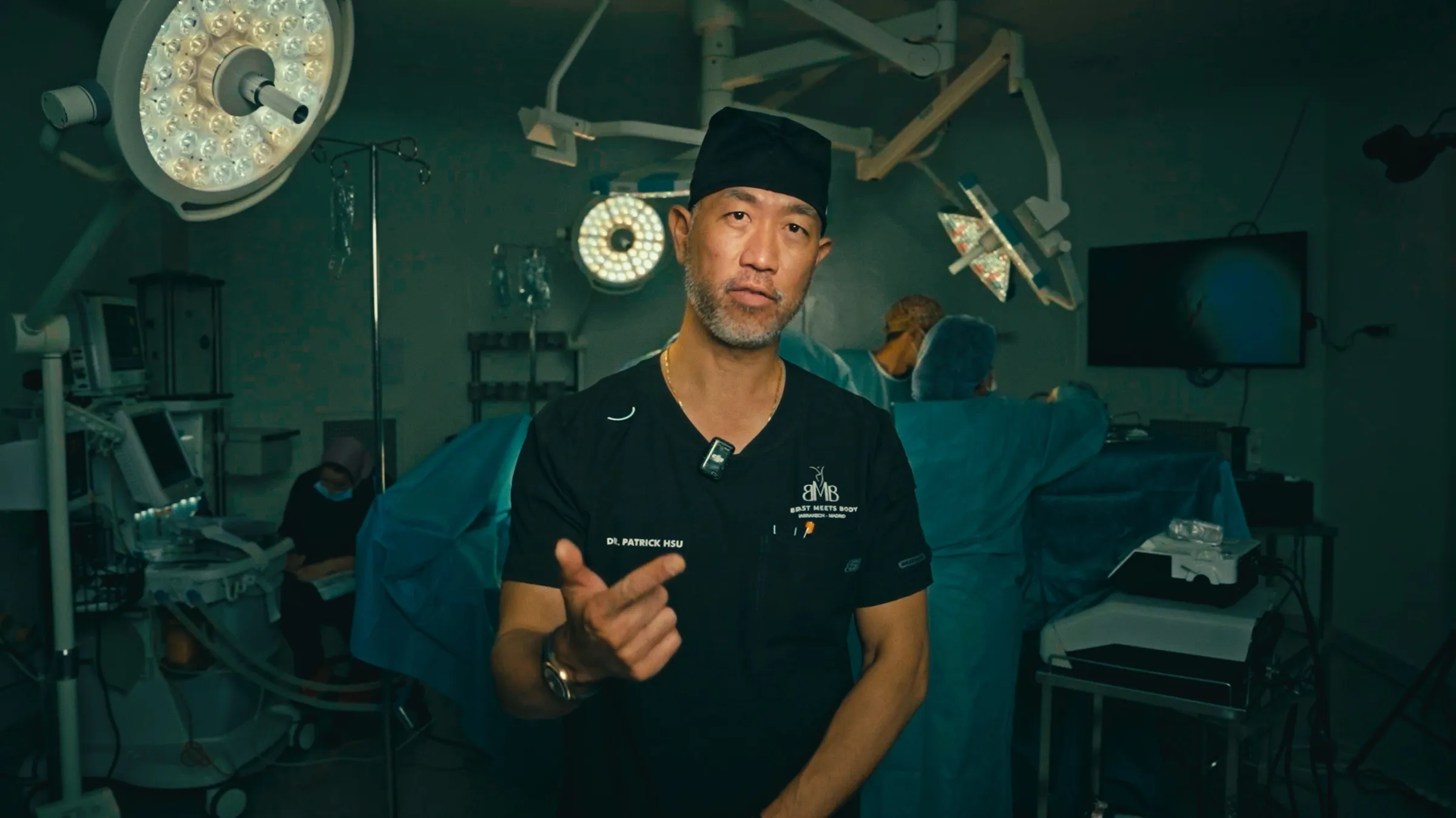 Dr. Patrick Hsu speaking in the operating room